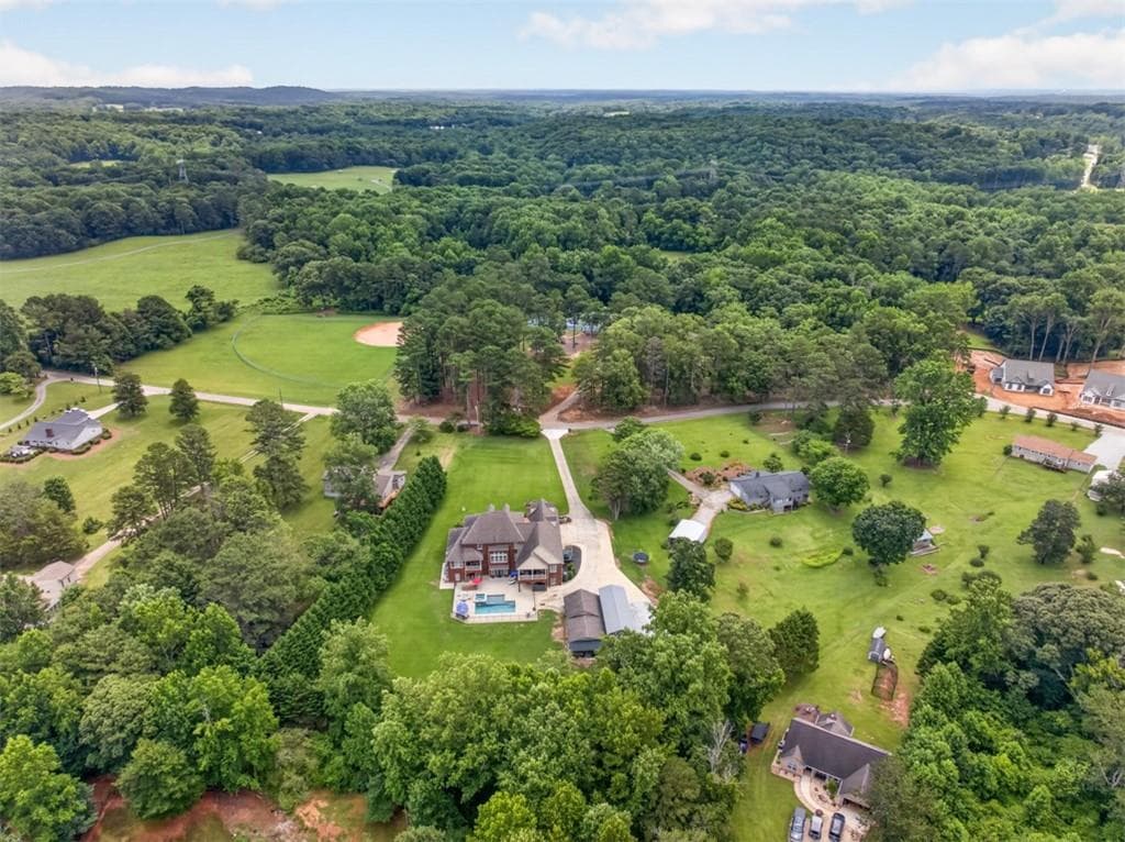 9 bedroom, 7 bathroom, 9,752 sq ft single family residence under contract at 4728 E Reed Road, Gainesville, GA 30507 — photo 3