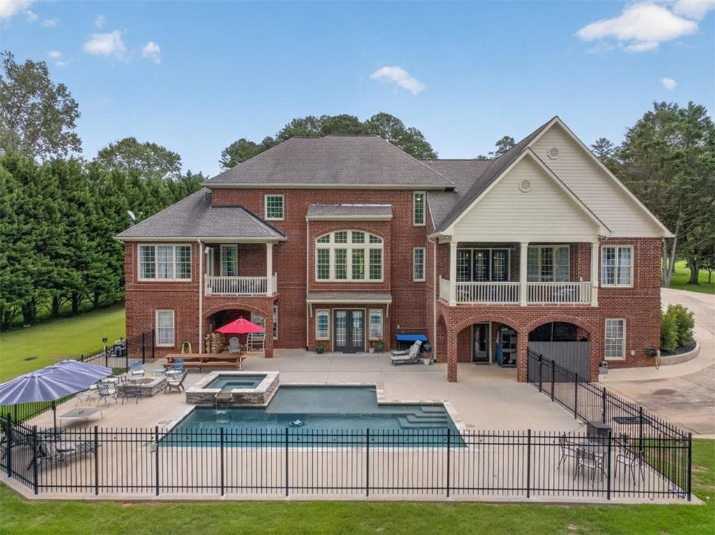 9 bedroom, 7 bathroom, 9,752 sq ft single family residence under contract at 4728 E Reed Road, Gainesville, GA 30507 — photo 2
