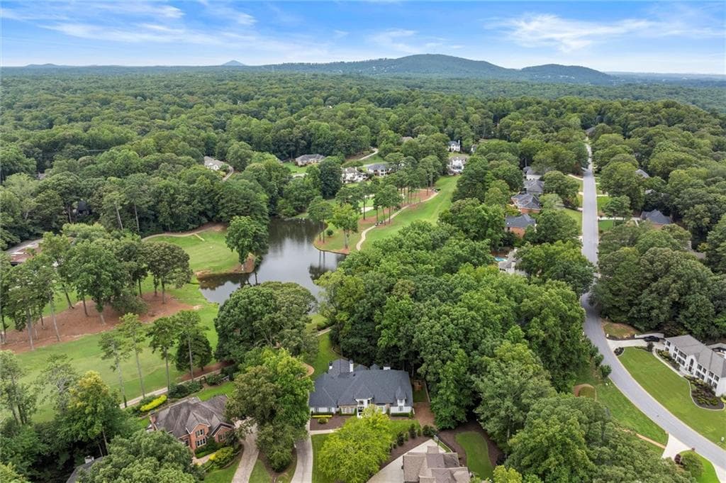 5 bedroom, 6 bathroom, 7,240 sq ft single family residence for sale at 1460 Lakemist Court, Roswell, GA 30075 — photo 2