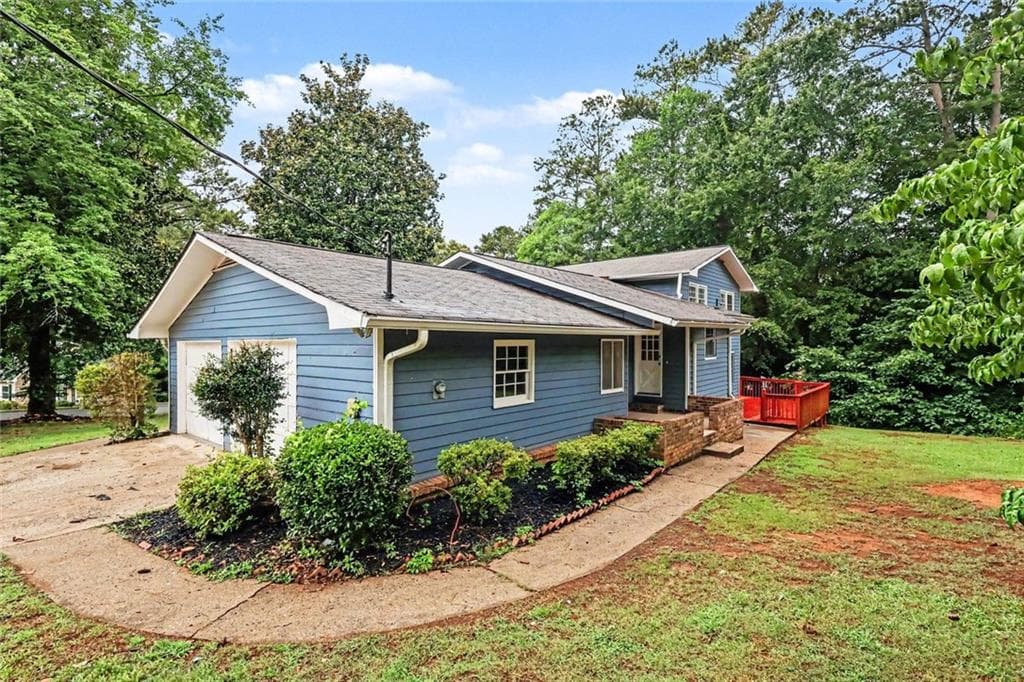 5 bedroom, 3 bathroom, 2,393 sq ft single family residence for sale at 3348 Goldenchain Drive, Lithonia, GA 30038