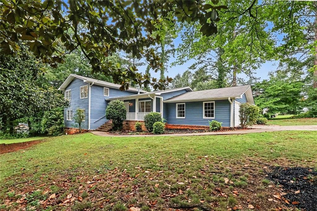 5 bedroom, 3 bathroom, 2,393 sq ft single family residence for sale at 3348 Goldenchain Drive, Lithonia, GA 30038 — photo 2
