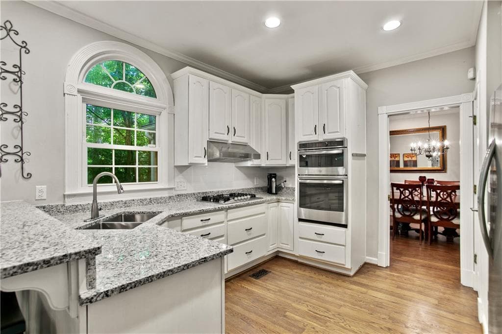 5 bedroom, 4 bathroom, 3,312 sq ft single family residence under contract at 977 Marbury Court, Marietta, GA 30064 — photo 5