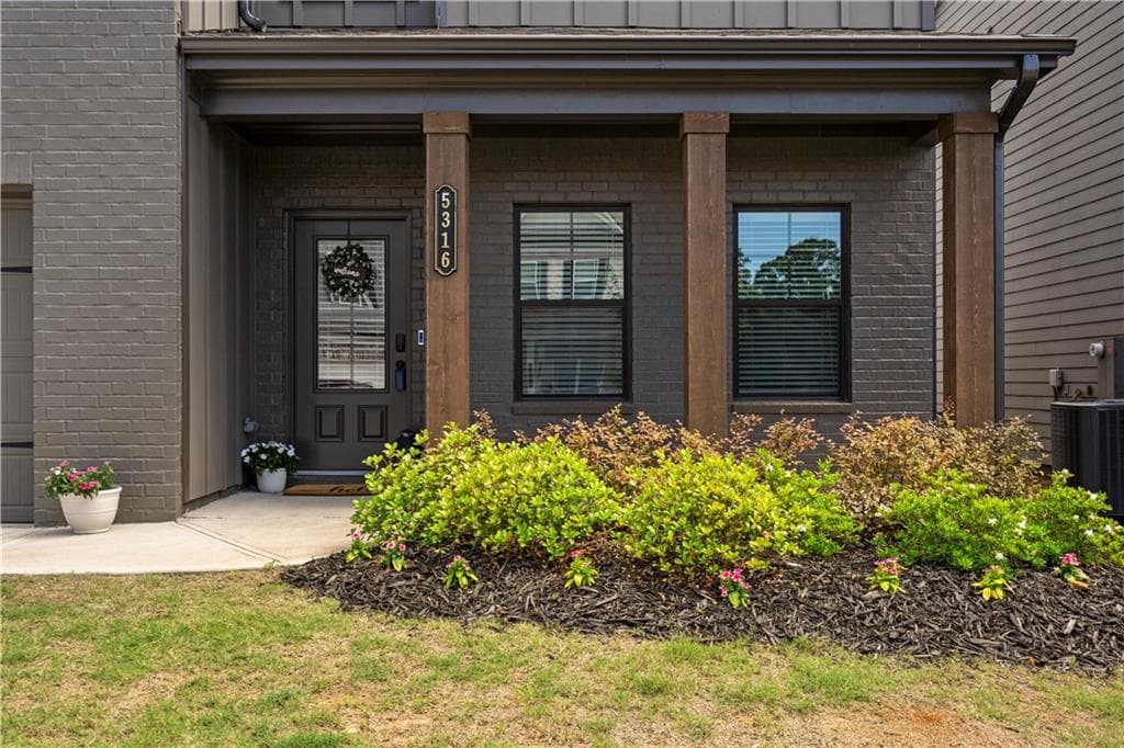5 bedroom, 3 bathroom, 2,535 sq ft single family residence for sale at 5316 Milford Drive, Flowery Branch, GA 30507 — photo 6