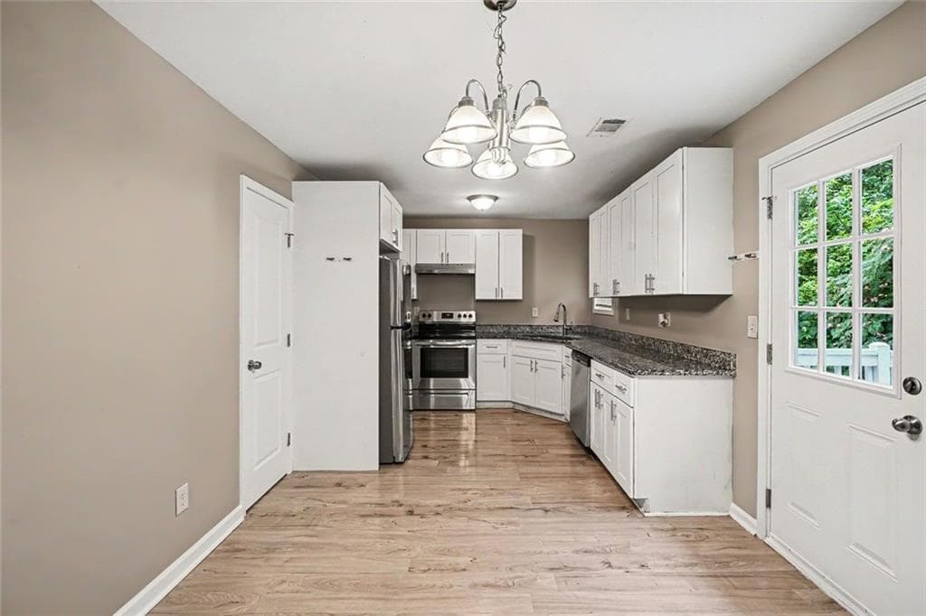 4 bedroom, 3 bathroom, 1,939 sq ft single family residence for sale at 6749 Silver Maple Drive, Rex, GA 30273 — photo 5