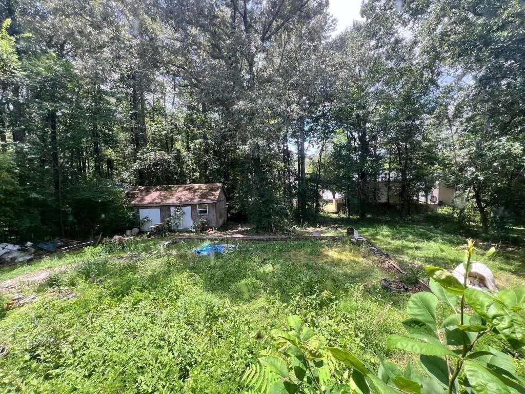 4 bedroom, 4 bathroom, 1,866 sq ft single family residence under contract at 2460 Hallie Mill Road, Atlanta, GA 30349 — photo 3