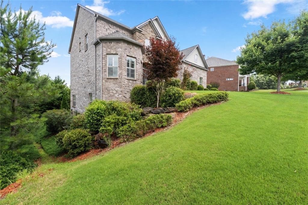 6 bedroom, 5 bathroom, 5,120 sq ft single family residence for sale at 2815 Waterstone Drive, Cumming, GA 30041 — photo 4