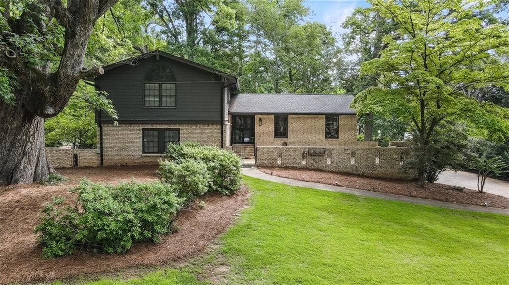 4 bedroom, 3 bathroom, 2,893 sq ft single family residence sold at 5616 Mill Trace Drive, Dunwoody, GA 30338