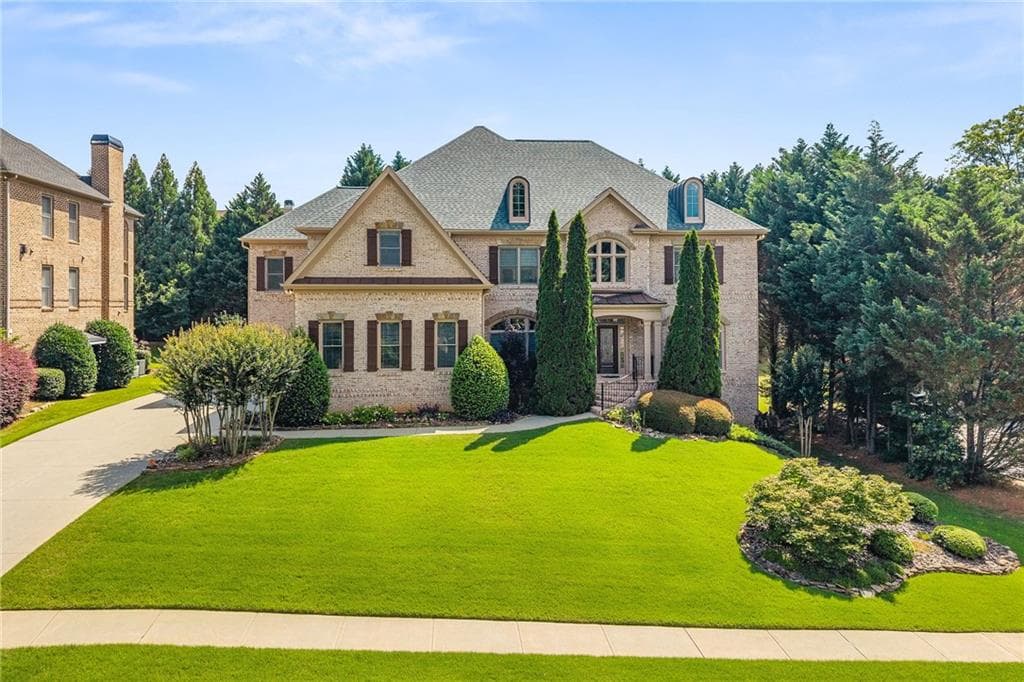 6 bedroom, 7 bathroom, 7,675 sq ft single family residence for sale at 2122 Hunters Green Drive, Lawrenceville, GA 30043