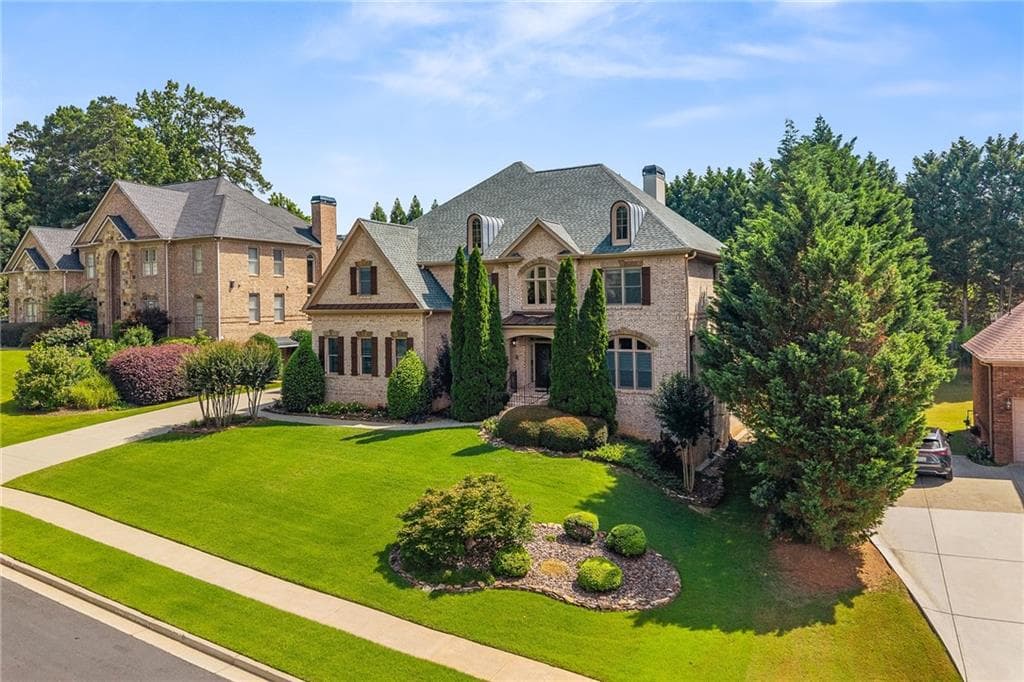 6 bedroom, 7 bathroom, 7,675 sq ft single family residence for sale at 2122 Hunters Green Drive, Lawrenceville, GA 30043 — photo 3