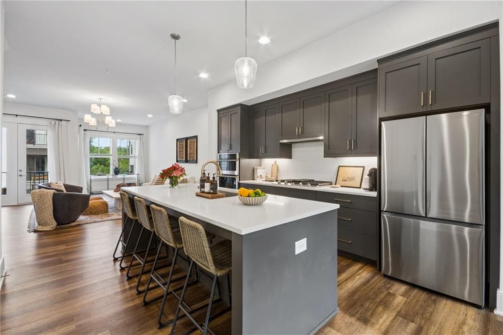 4 bedroom, 5 bathroom, 2,900 sq ft townhouse for sale at 1344 Booth Avenue, Atlanta, GA 30318 — photo 1 of 30
