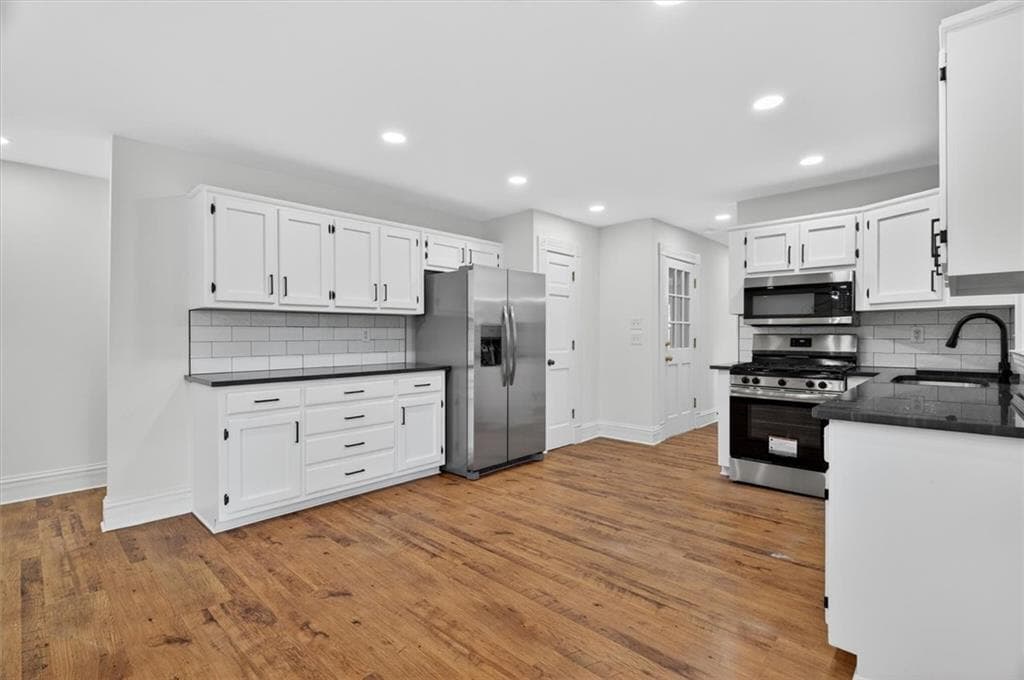 4 bedroom, 3 bathroom, 2,373 sq ft single family residence for sale at 598 Saddletop Lane, Lawrenceville, GA 30044 — photo 5