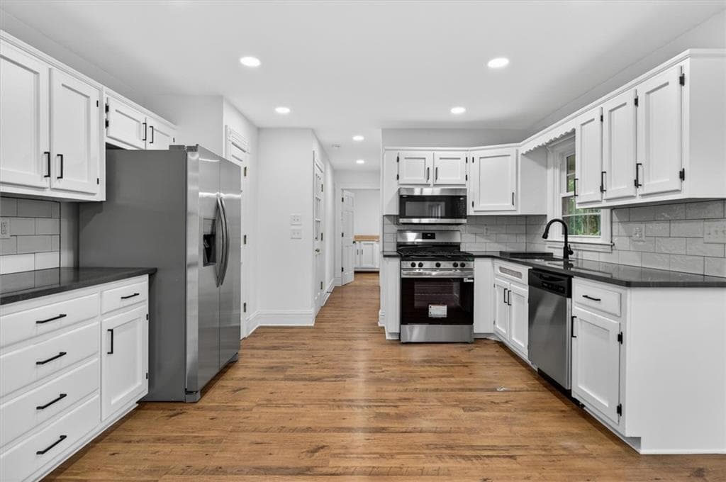 4 bedroom, 3 bathroom, 2,373 sq ft single family residence for sale at 598 Saddletop Lane, Lawrenceville, GA 30044 — photo 6