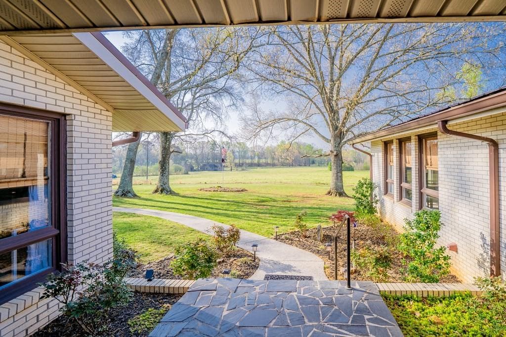 5 bedroom, 4 bathroom, 4,640 sq ft single family residence for sale at 1254 Mountain Loop Road, Sugar Valley, GA 30746 — photo 3