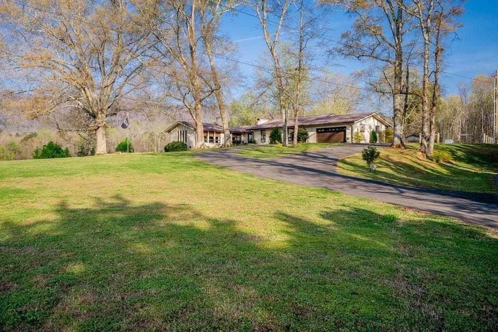 5 bedroom, 4 bathroom, 4,640 sq ft single family residence for sale at 1254 Mountain Loop Road, Sugar Valley, GA 30746 — photo 5