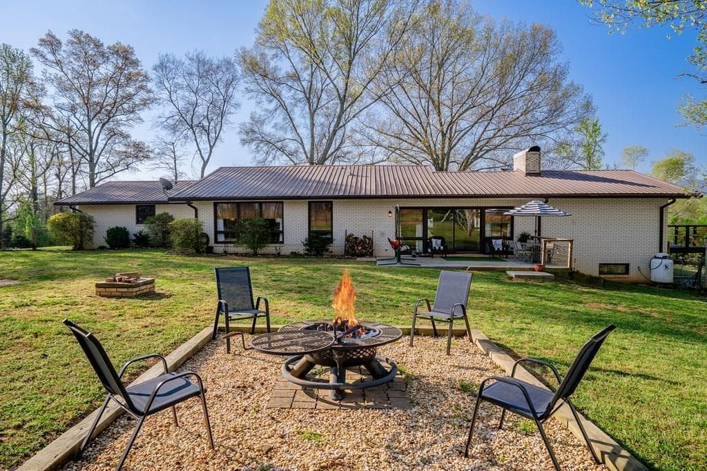 5 bedroom, 4 bathroom, 4,640 sq ft single family residence for sale at 1254 Mountain Loop Road, Sugar Valley, GA 30746 — photo 7