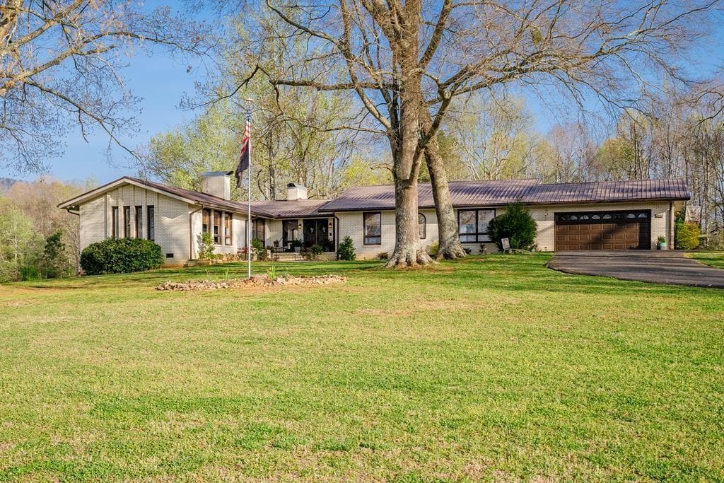 5 bedroom, 4 bathroom, 4,640 sq ft single family residence for sale at 1254 Mountain Loop Road, Sugar Valley, GA 30746 — photo 9