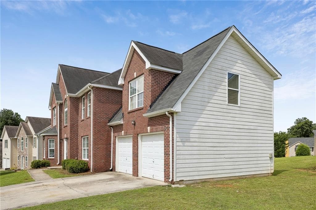 5 bedroom, 3 bathroom, 2,250 sq ft single family residence for sale at 4951 Estonian Drive, Fairburn, GA 30213 — photo 2