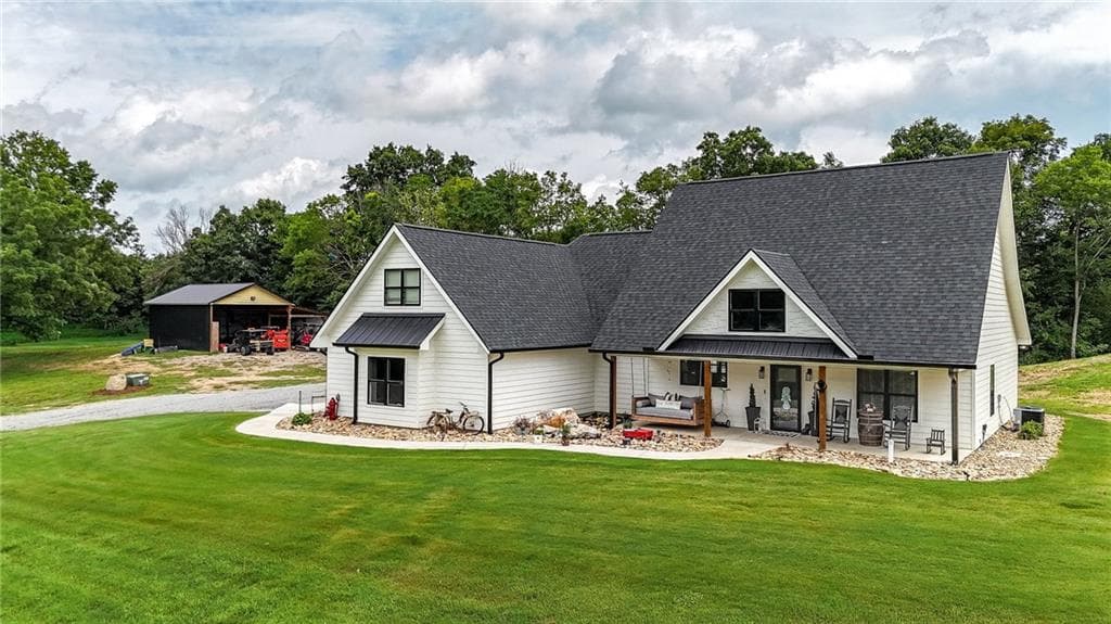 4 bedroom, 3 bathroom, 2,307 sq ft single family residence for sale at 385 Owens Gin Road, Calhoun, GA 30701 — photo 2