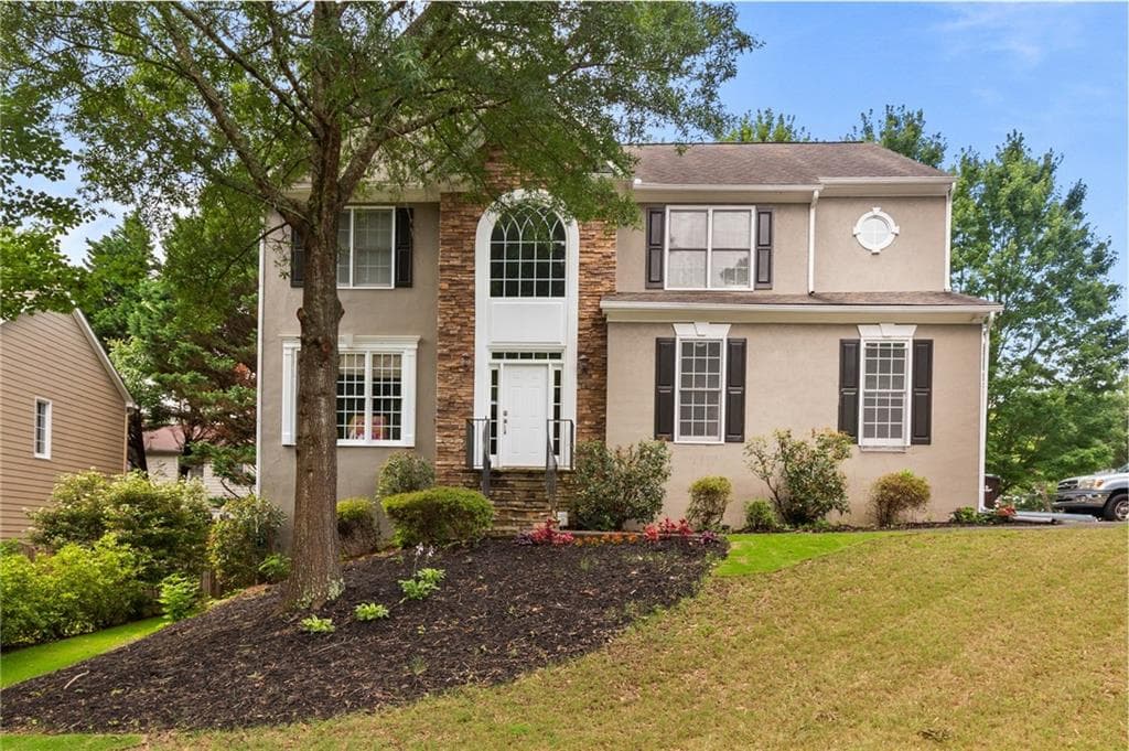 4 bedroom, 3 bathroom, 2,696 sq ft single family residence for sale at 4000 Weatherford Circle, Alpharetta, GA 30009 — photo 1 of 39