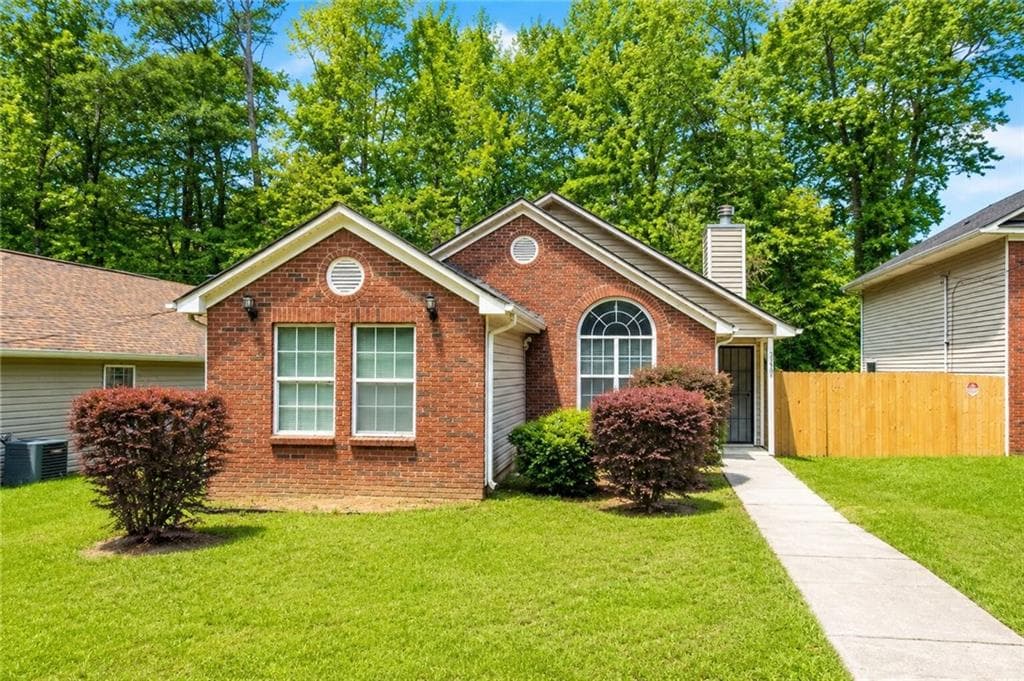 4 bedroom, 2 bathroom, 1,476 sq ft single family residence for sale at 2341 Daniel Road, Atlanta, GA 30331 — photo 2
