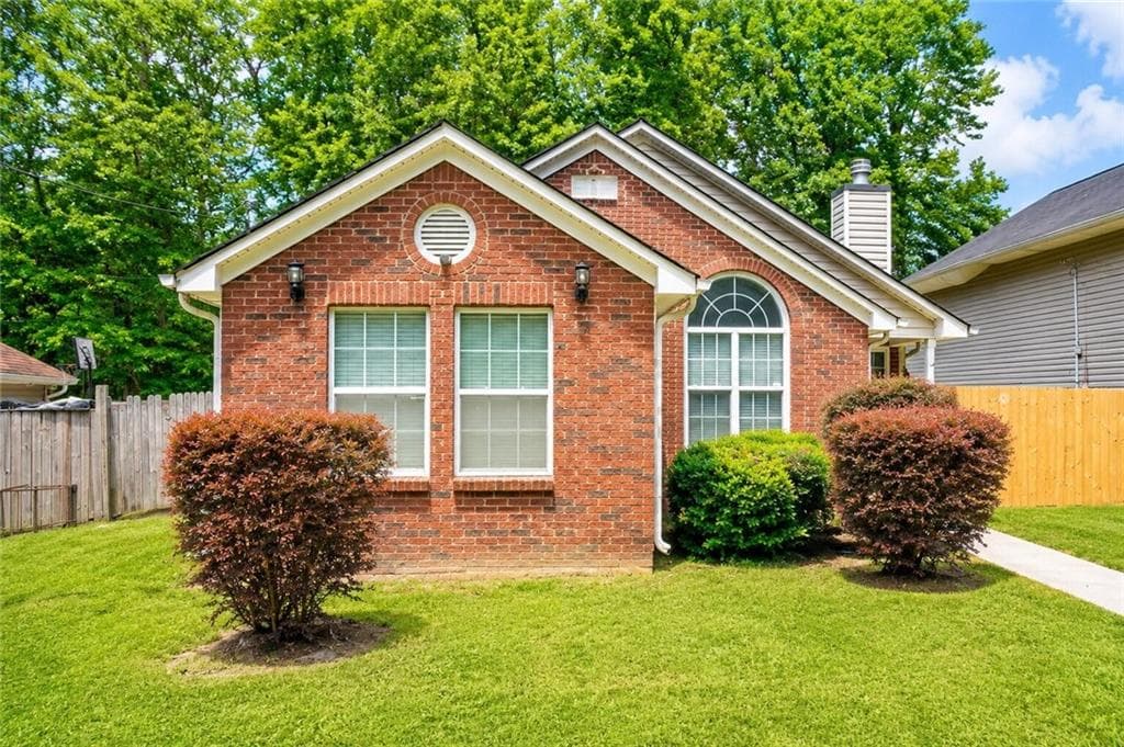 4 bedroom, 2 bathroom, 1,476 sq ft single family residence for sale at 2341 Daniel Road, Atlanta, GA 30331 — photo 3