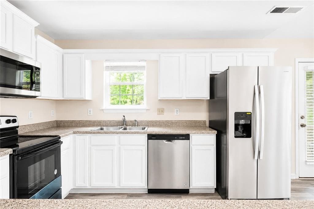 4 bedroom, 2 bathroom, 1,476 sq ft single family residence for sale at 2341 Daniel Road, Atlanta, GA 30331 — photo 7