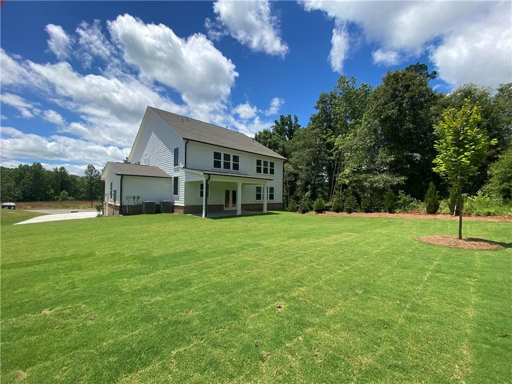 5 bedroom, 4 bathroom, 3,688 sq ft single family residence for sale at 4620 Cogburn Path, Cumming, GA 30028 — photo 3