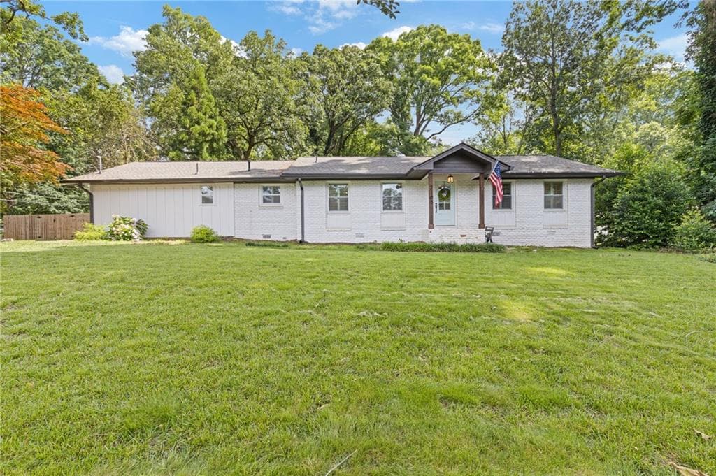 4 bedroom, 3 bathroom, 2,083 sq ft single family residence sold at 2165 Lower Roswell Road, Marietta, GA 30068