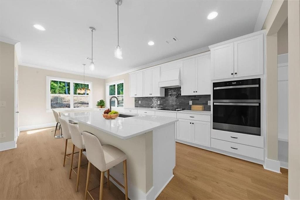 4 bedroom, 3 bathroom, 2,622 sq ft single family residence for sale at 5582 Overview Drive, Flowery Branch, GA 30542 — photo 4