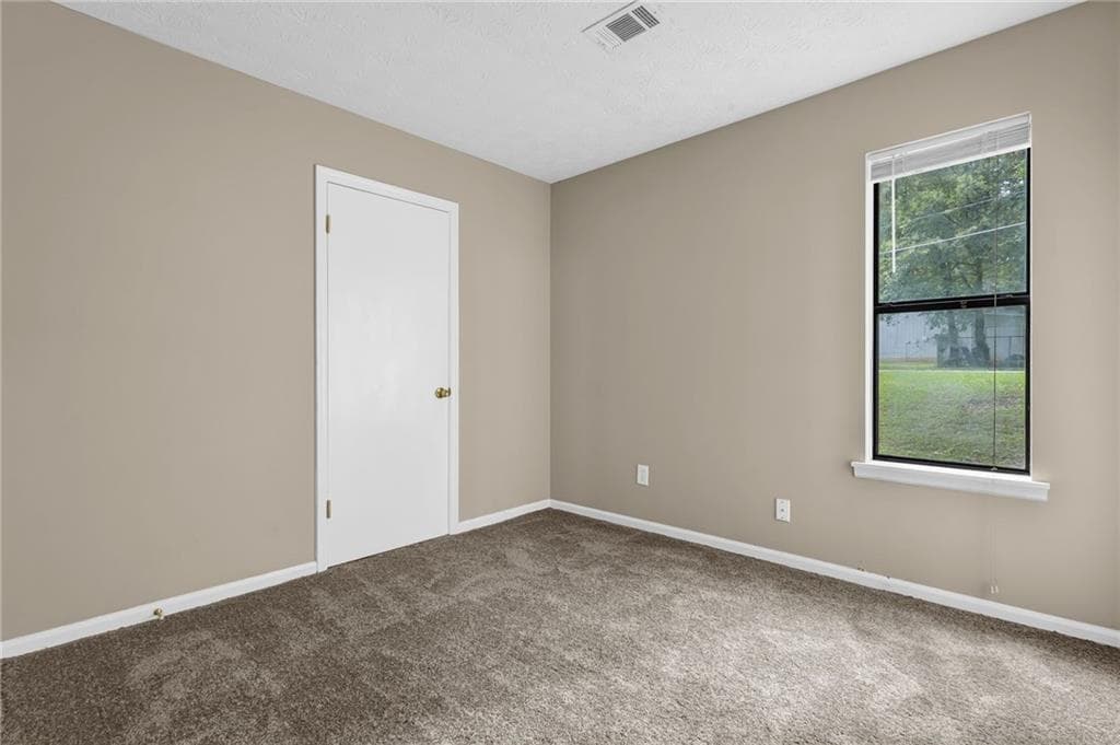 3 bedroom, 2 bathroom, 1,080 sq ft single family residence for sale at 8997 Huntwood Lane, Riverdale, GA 30274 — photo 4