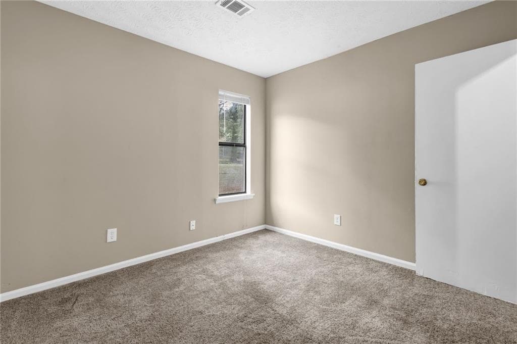3 bedroom, 2 bathroom, 1,080 sq ft single family residence for sale at 8997 Huntwood Lane, Riverdale, GA 30274 — photo 6