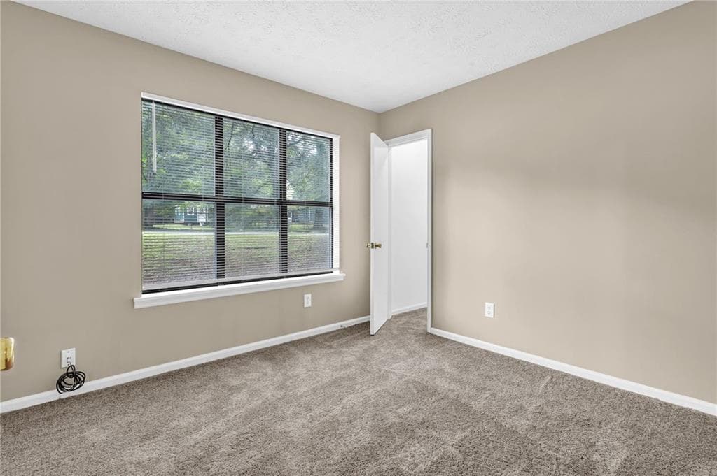 3 bedroom, 2 bathroom, 1,080 sq ft single family residence for sale at 8997 Huntwood Lane, Riverdale, GA 30274 — photo 7