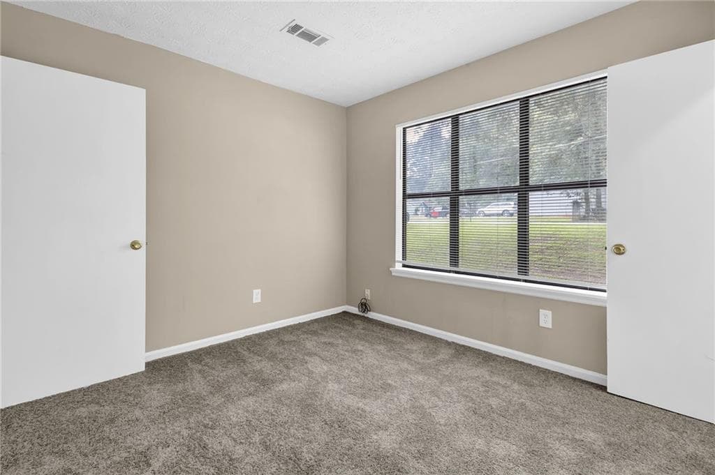 3 bedroom, 2 bathroom, 1,080 sq ft single family residence for sale at 8997 Huntwood Lane, Riverdale, GA 30274 — photo 9