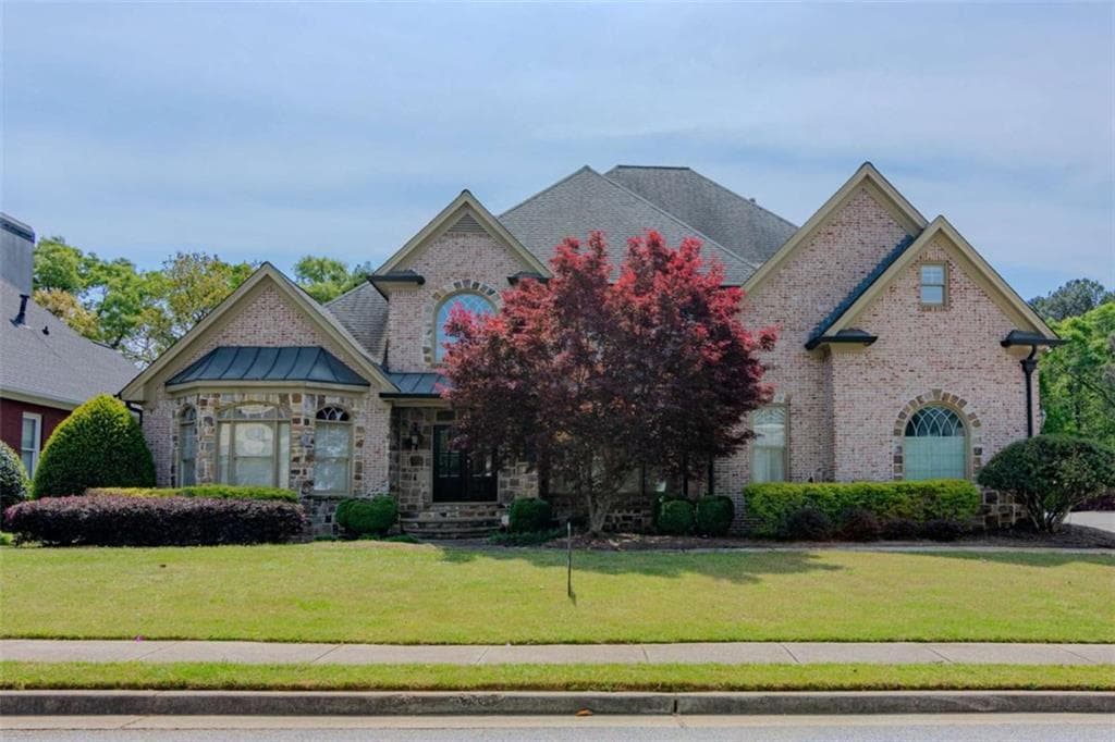5 bedroom, 6 bathroom, 8,430 sq ft single family residence for sale at 818 Natchez Valley Trace, Grayson, GA 30017 — photo 2