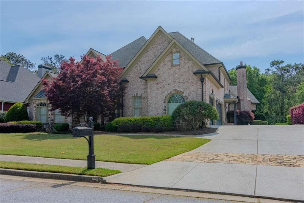 5 bedroom, 6 bathroom, 8,430 sq ft single family residence for sale at 818 Natchez Valley Trace, Grayson, GA 30017 — photo 4