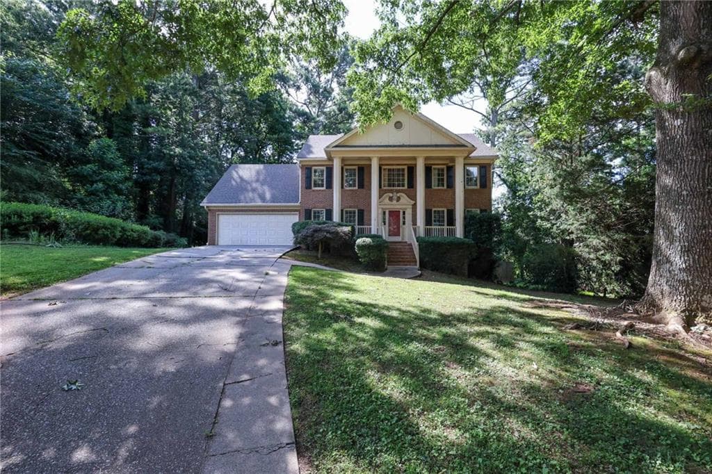 5 bedroom, 3 bathroom, 3,498 sq ft single family residence for sale at 4128 Mayflower Court, Lilburn, GA 30047