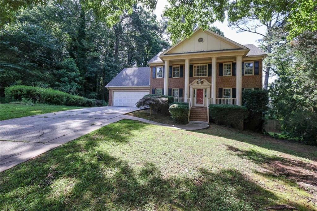 5 bedroom, 3 bathroom, 3,498 sq ft single family residence for sale at 4128 Mayflower Court, Lilburn, GA 30047 — photo 3