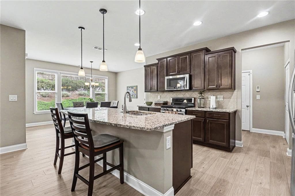 5 bedroom, 4 bathroom, 2,676 sq ft single family residence for sale at 1935 Bromwick Court, Cumming, GA 30040 — photo 4