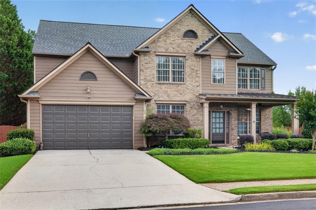 5 bedroom, 3 bathroom, 3,084 sq ft single family residence for sale at 6630 Grand Magnolia Drive, Sugar Hill, GA 30518 — photo 2