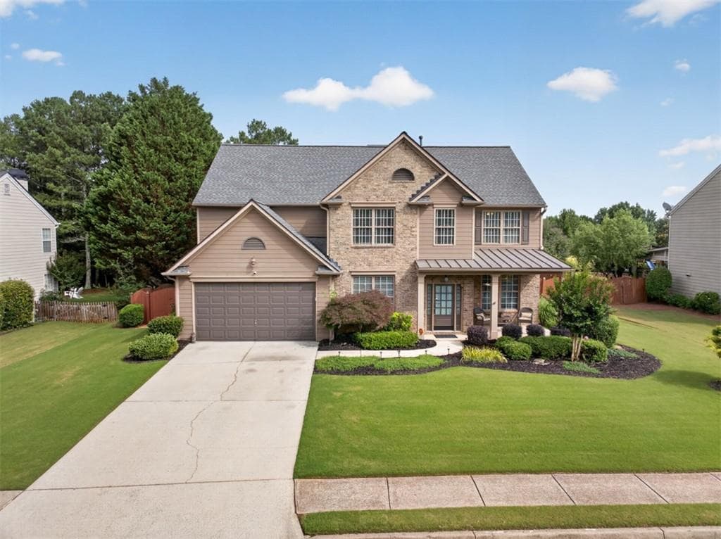 5 bedroom, 3 bathroom, 3,084 sq ft single family residence for sale at 6630 Grand Magnolia Drive, Sugar Hill, GA 30518 — photo 4