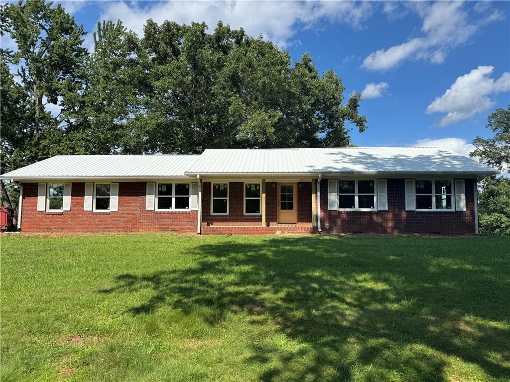 3 bedroom, 2 bathroom, 1,898 sq ft single family residence under contract at 1049 Ben Higgins Road, Dahlonega, GA 30533