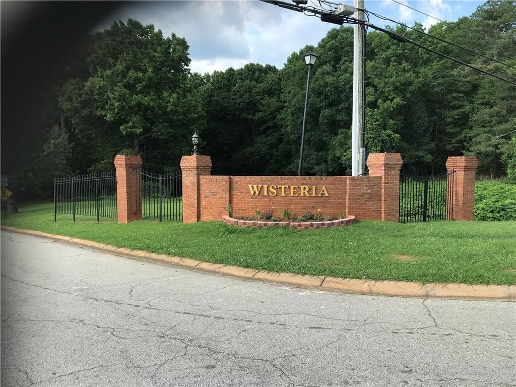 5 bedroom, 4 bathroom, 4,584 sq ft single family residence for sale at 275 Wisteria Boulevard, Covington, GA 30016 — photo 2