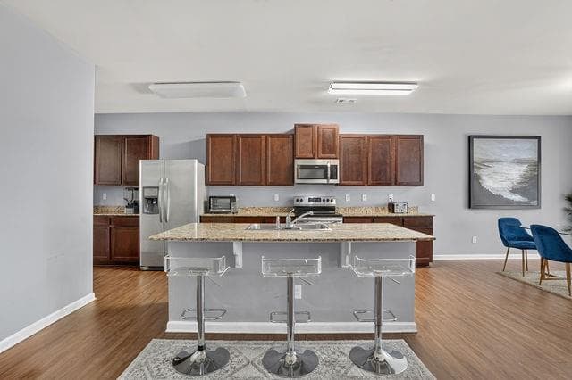 5 bedroom, 3 bathroom, 3,303 sq ft single family residence for sale at 637 Yazzie Place, Atlanta, GA 30349 — photo 3