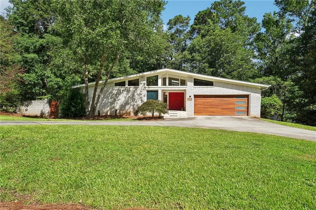 5 bedroom, 4 bathroom, 4,741 sq ft single family residence sold at 2018 Glacier Drive, Stone Mountain, GA 30087