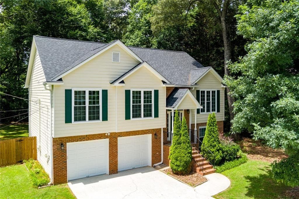 4 bedroom, 3 bathroom, 2,127 sq ft single family residence sold at 2450 Whitehead Place Drive, Suwanee, GA 30024