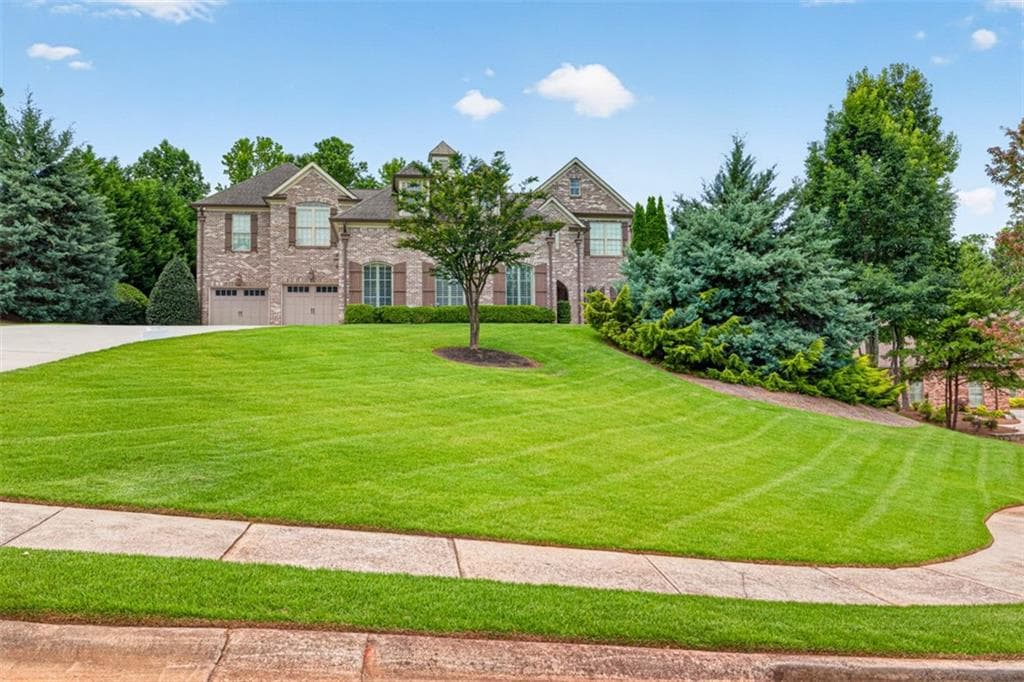 6 bedroom, 7 bathroom, 6,101 sq ft single family residence for sale at 6509 Snug Harbor Court, Flowery Branch, GA 30542 — photo 3