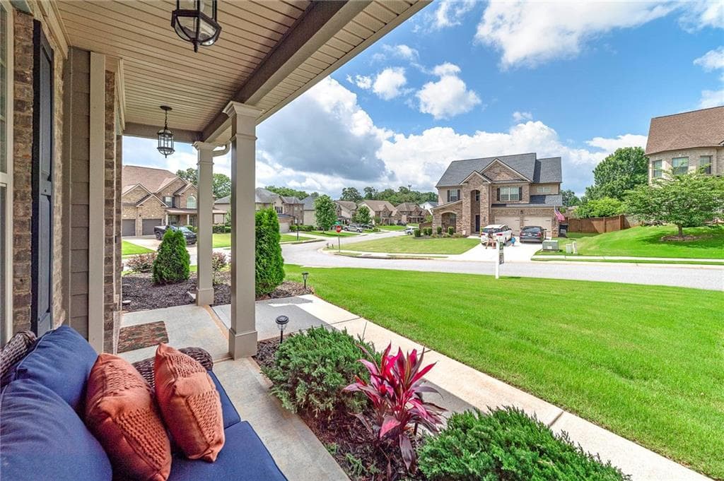 6 bedroom, 4 bathroom, 3,776 sq ft single family residence for sale at 5410 Whisper Court, Cumming, GA 30028 — photo 2