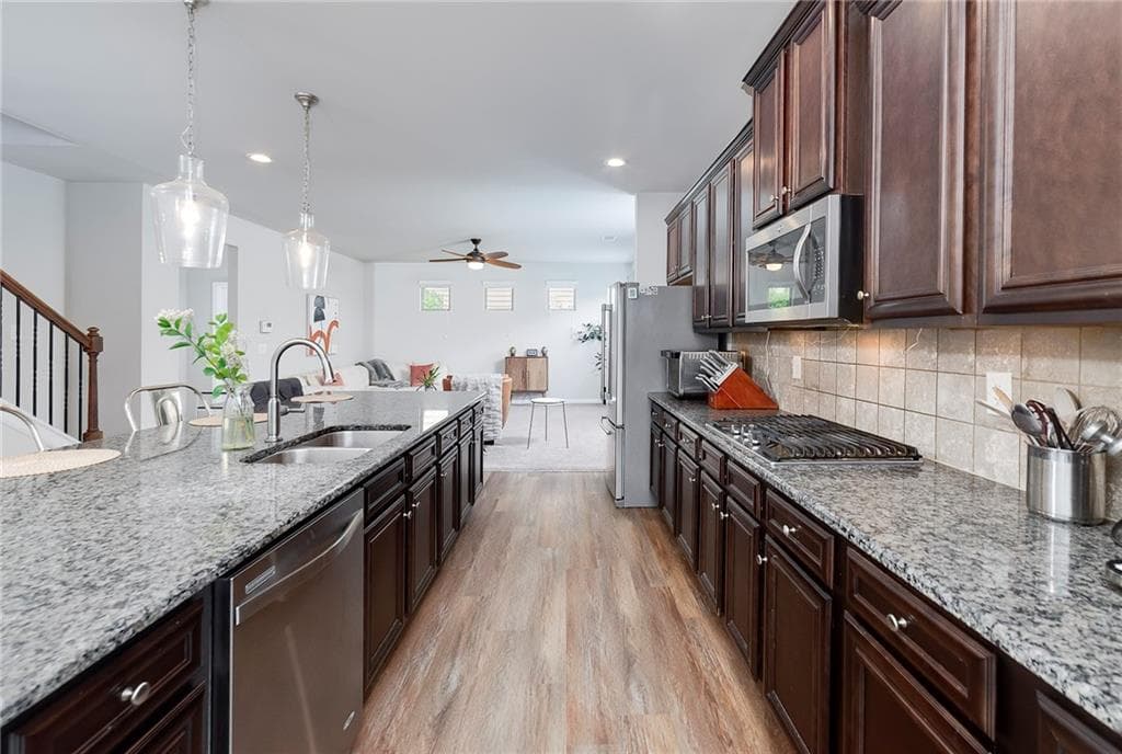 6 bedroom, 4 bathroom, 3,776 sq ft single family residence for sale at 5410 Whisper Court, Cumming, GA 30028 — photo 9