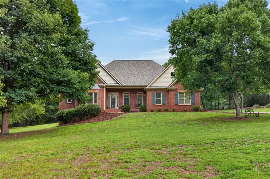 4 bedroom, 4 bathroom, 3,232 sq ft single family residence for sale at 1623 Double Springs Church Road, Monroe, GA 30656