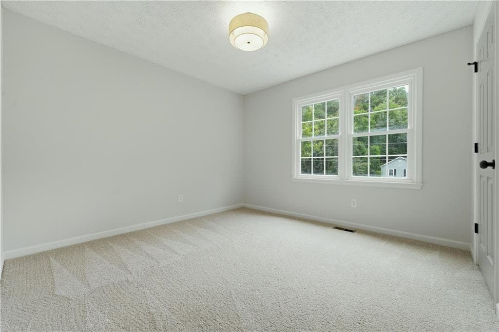 3 bedroom, 2 bathroom, 2,302 sq ft single family residence for sale at 6231 Emerald Springs Drive, Acworth, GA 30102 — photo 9